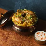 Golden Saffron Chicken Dum Biryani - Nawabi Dawat