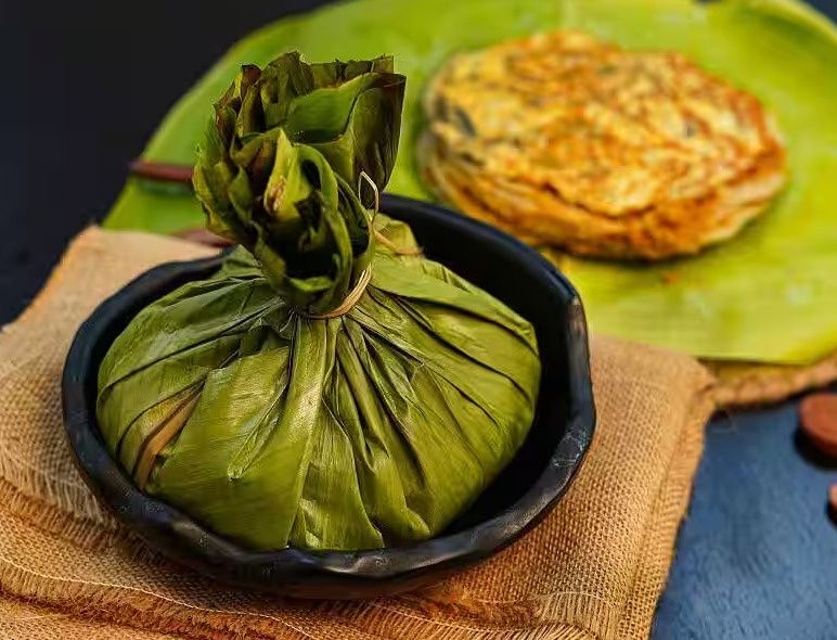 Chicken Kizhi Parotta