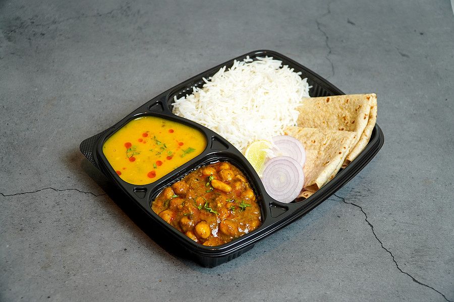 Mini Veg Thali (Chole + Daal Fry + 2 Chapati + Rice)