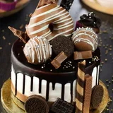 Dark Drip Overload Supreme Cake