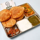 4 Puri with Aloo, Raita, Chatni