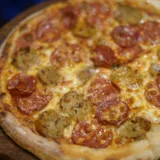 Meat Lover's: Chicken Pepperoni, Pork Pepperoni And Chicken Meatball.