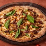 Bianco: White Creamy Sauce Topped With Savory BBQ Chicken.