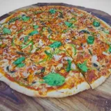 The Wilderness Pizza (18 Inch- Largest In Durgapur)Chicken And Pork Pepperoni, Mushroom, Onion And Green Bell Pepper.