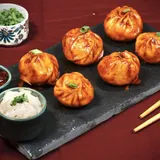 Veg Pan Tossed Momos [8 Pcs]
