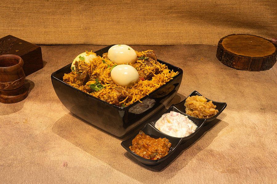Mutton Biryani 3 Serve (Egg Raitha Brinjal Gravy Bread Halwa)