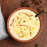 Coconut Bati With Rabari Dip (2 Pcs)