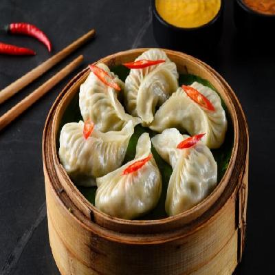 Chicken Schezwan Momos ( 6 pcs )