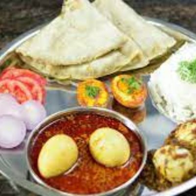 2 Pc Egg Curry + 2 Roti + Half Rice