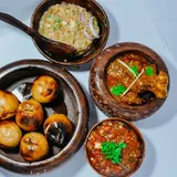 Litti Chokha With Chicken Curry